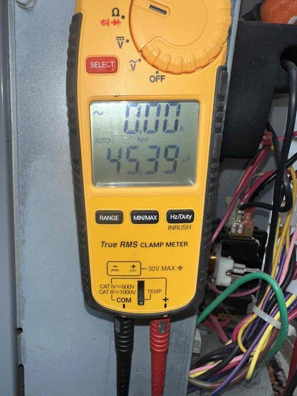 # HVAC Cooling Maintenance Summary

Completed routine preventative maintenance on residential air conditioning system as part of ongoing cooling season service agreement. Performed comprehensive electrical diagnostics using digital clamp meter, measuring amperage draw of 45.39 amps to verify compressor and condenser operation within manufacturer specifications. Inspected control panel wiring connections, terminals, and electrical components for proper voltage, secure connections, and signs of wear or degradation.

# Detailed Service Description

Performed scheduled preventative maintenance inspection on cooling system. Accessed outdoor condensing unit and indoor air handler to complete comprehensive system evaluation. 

Conducted electrical system diagnostics using calibrated True RMS clamp meter to measure operating amperage and verify equipment performance. Recorded compressor amperage at 45.39 amps during operation, confirming unit is drawing current within normal parameters. Inspec