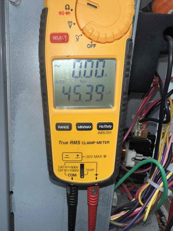 # HVAC Cooling Maintenance Summary

Completed routine preventative maintenance on residential air conditioning system as part of ongoing cooling season service agreement. Performed comprehensive electrical diagnostics using digital clamp meter, measuring amperage draw of 45.39 amps to verify compressor and condenser operation within manufacturer specifications. Inspected control panel wiring connections, terminals, and electrical components for proper voltage, secure connections, and signs of wear or degradation.

# Detailed Service Description

Performed scheduled preventative maintenance inspection on cooling system. Accessed outdoor condensing unit and indoor air handler to complete comprehensive system evaluation. 

Conducted electrical system diagnostics using calibrated True RMS clamp meter to measure operating amperage and verify equipment performance. Recorded compressor amperage at 45.39 amps during operation, confirming unit is drawing current within normal parameters. Inspec