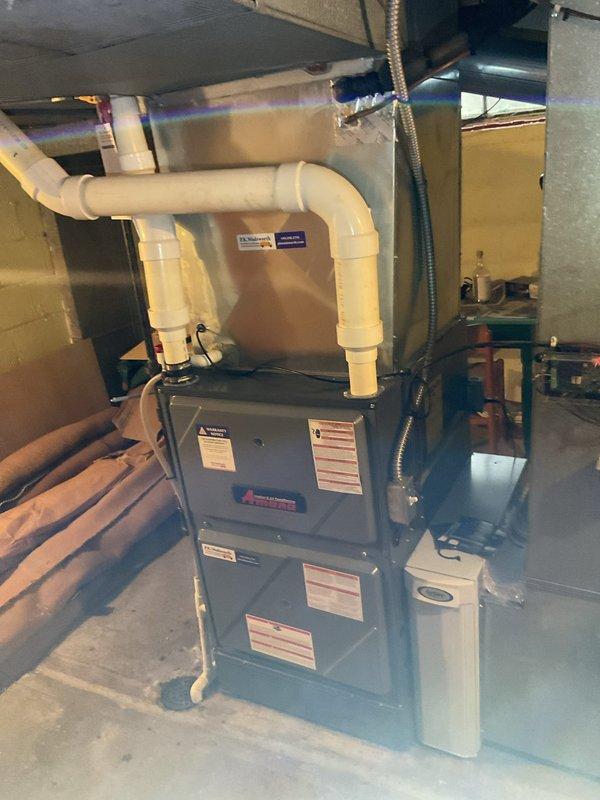 Performed comprehensive cooling maintenance on residential HVAC system located in basement utility area. Inspected air handler unit, verified proper operation of all components, checked refrigerant levels, cleaned condensate drain lines, and tested system controls to ensure optimal cooling performance for the season.