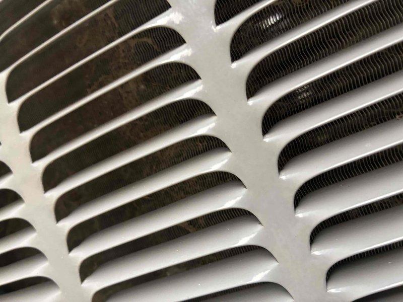 Completed comprehensive cooling system tune-up including inspection of air handler components, return air grilles, and outdoor condenser unit. All ventilation registers were examined and found to be in proper working condition with adequate airflow, and the system was verified to be operating within manufacturer specifications.