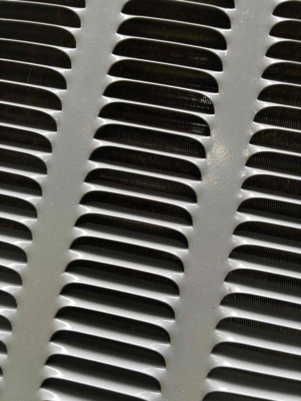 Completed comprehensive cooling system tune-up including inspection of air handler components, return air grilles, and outdoor condenser unit. All ventilation registers were examined and found to be in proper working condition with adequate airflow, and the system was verified to be operating within manufacturer specifications.
