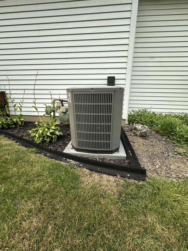 Completed scheduled cooling system maintenance on residential outdoor condensing unit. Performed comprehensive inspection of electrical components including capacitor and contactor, verified all wire connections were secure, and confirmed unit operational status. Equipment showing normal wear consistent with outdoor installation; system functioning within specifications.