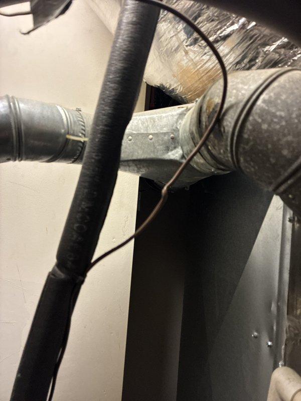 Conducted on-site assessment of existing HVAC system to provide replacement estimate for cooling equipment, with customer requesting options for both complete heating and cooling system replacement as well as cooling-only replacement. Inspected attic-mounted air handler unit, associated ductwork including flexible and rigid metallic supply ducts, refrigerant lines, and electrical connections. Evaluated basement mechanical room containing furnace unit, water heater, existing ductwork distribution system, and associated plumbing infrastructure. Documented current equipment configuration, ductwork layout, and installation conditions through comprehensive photography to develop accurate replacement proposals addressing customer's cooling system priorities.