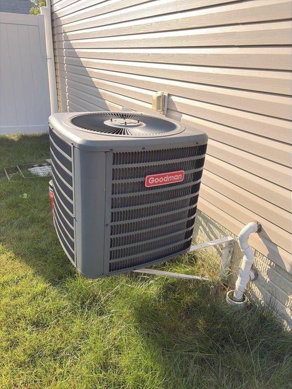 Completed scheduled preventive maintenance on residential Goodman cooling system. Performed comprehensive inspection of outdoor condensing unit, verified proper operation of compressor and condenser fan motor, and checked refrigerant levels. Measured supply air temperature at 54.5°F, confirming adequate cooling performance and proper system operation. Inspected condensate drainage system including PVC discharge lines for proper flow and cleared any obstructions. Visually examined condenser coil fins for damage or debris accumulation, verified unit is level on concrete pad, and confirmed all electrical connections are secure. System operating within manufacturer specifications with no deficiencies noted at time of service.