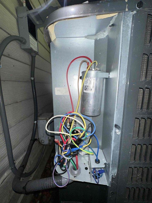 Performed routine cooling maintenance on residential HVAC system. Inspected and documented electrical components including 40A 250V TR406 fuses in disconnect, verified capacitor condition, and checked wiring connections within condensing unit. All components found in operational condition with system running properly upon completion.