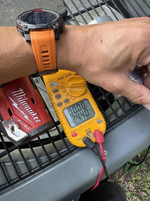 Completed comprehensive cooling system tune-up on outdoor condensing unit. Performed electrical diagnostics using digital multimeter, recording voltage readings of 254.8V and verifying proper amperage draw of 52.7A on compressor circuit. Inspected condenser coil condition, checked refrigerant pressures, and verified all electrical connections were secure and within manufacturer specifications. Unit operating efficiently with all parameters within normal range.
