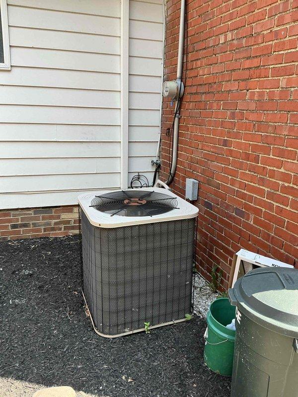 Conducted site evaluation for HVAC system replacement in residential property. Assessed existing furnace, air conditioning condenser unit, and associated ductwork including plenum and refrigerant line configuration. Documented current equipment specifications and installation conditions to provide comprehensive replacement options for aging cooling system.