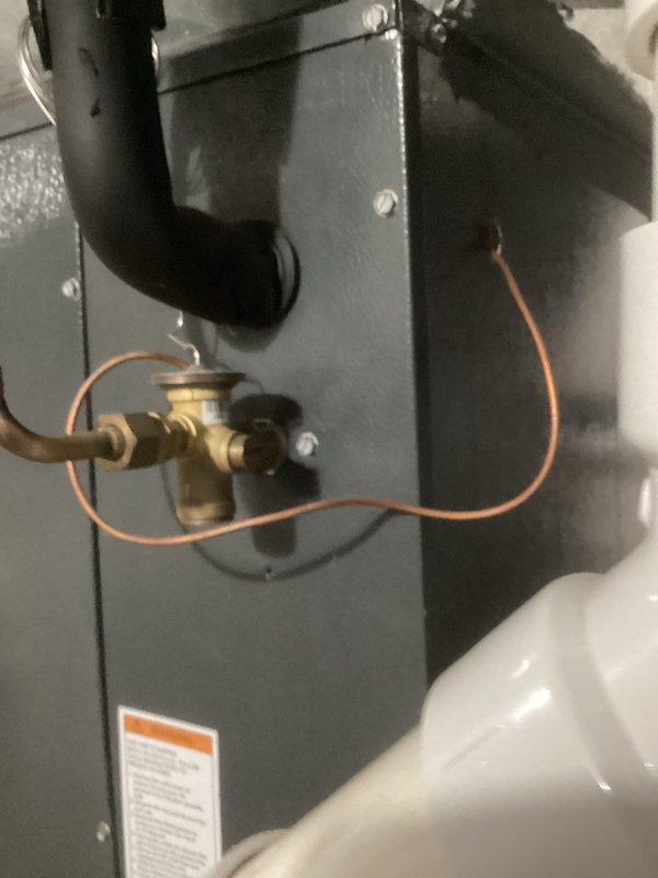 Completed scheduled cooling maintenance on residential HVAC system. Performed comprehensive inspection of refrigeration components including copper line sets, brass service valves, and condensate management system. All equipment operating within normal parameters with proper refrigerant flow and drainage functioning as designed.