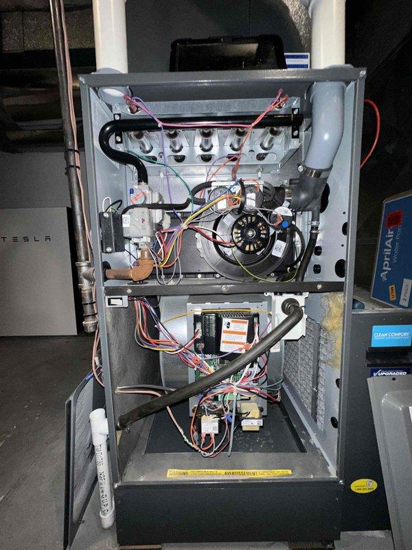 Completed routine cooling season maintenance on residential HVAC system as part of scheduled preventive maintenance program. Performed comprehensive inspection of furnace interior components including heat exchanger, blower motor assembly, control board, and electrical connections; verified all wiring connections were secure and properly terminated. Inspected exterior electrical disconnect switch and confirmed proper operation and safe electrical connections with appropriate wire terminations.