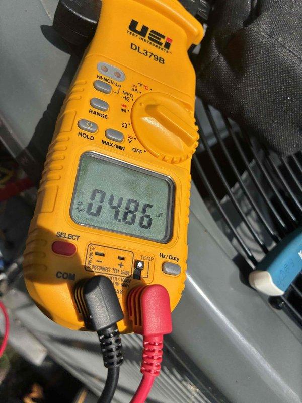 Completed scheduled preventive maintenance on residential cooling system. Performed comprehensive system diagnostics using digital multimeter and clamp meter to verify electrical parameters. Measured voltage at 39.1V and amperage draw at 48.6A to confirm proper compressor and condenser operation. Inspected all electrical connections, tested capacitor function, and verified refrigerant pressures within manufacturer specifications. System operating efficiently with no deficiencies noted.