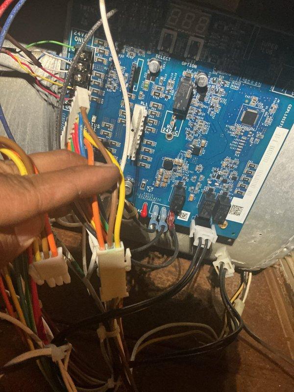 Replaced defective wiring harness on HVAC control system due to damaged wire connections affecting unit operation. Disconnected old harness from control board, installed new harness with proper wire routing and secure connections to all terminals, and verified system functionality upon completion.
