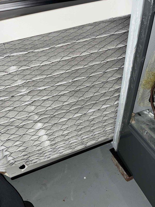 Completed routine cooling maintenance on HVAC system, including thorough inspection of blower assembly and air filtration components. Inspected squirrel cage blower wheel and motor assembly, confirming proper operation and structural integrity with no signs of damage or excessive wear. Evaluated air filter condition, noting moderate dust and debris accumulation on pleated media, and documented filter status for replacement consideration to maintain optimal airflow and system efficiency.