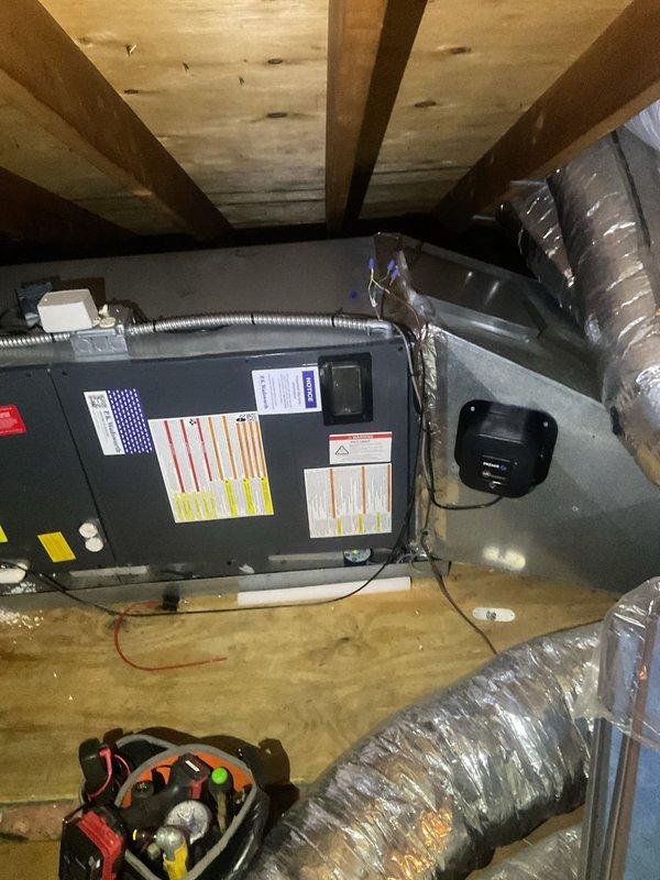 Completed scheduled cooling system maintenance visit on residential HVAC unit located in attic space. Inspected air handler and associated components, replaced dirty air filter with new pleated filter, verified proper operation of condensate drainage system, and confirmed all ductwork connections were secure and properly insulated.