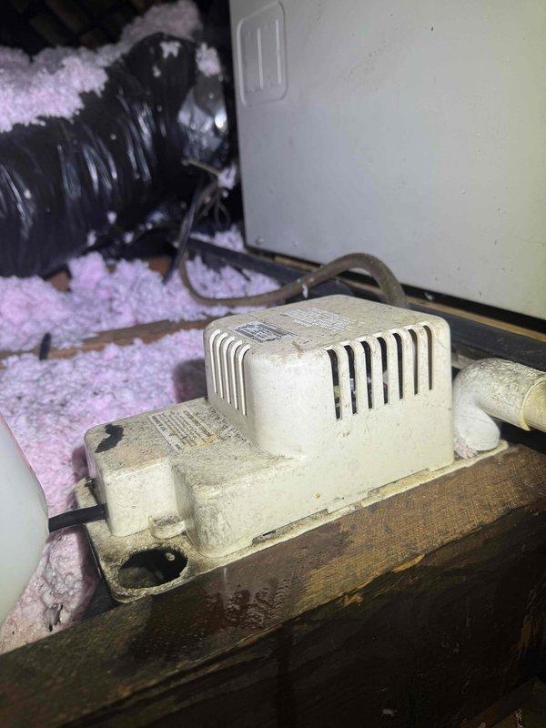 Completed scheduled preventive maintenance on attic-mounted air handler unit as part of ongoing cooling system service plan. Inspected and serviced HVAC equipment including air handler, condensate pump assembly, and associated drainage lines. All components found operating within normal parameters with condensate pump actively functioning and drainage system clear of obstructions.