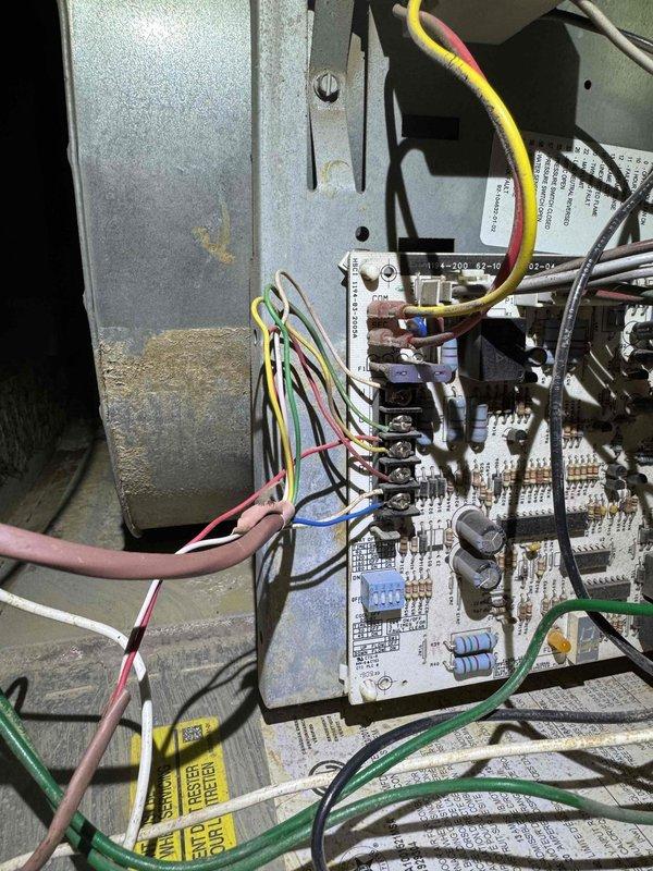Responded to service call for non-functional thermostat on self-installed A/C system. Upon inspection, diagnosed wiring issues at the control board where improper connections were preventing thermostat communication with the HVAC unit. Corrected wire terminations at the circuit board, verified proper voltage at transformer, and tested all control sequences. System restored to proper operation with thermostat now successfully controlling cooling cycles.