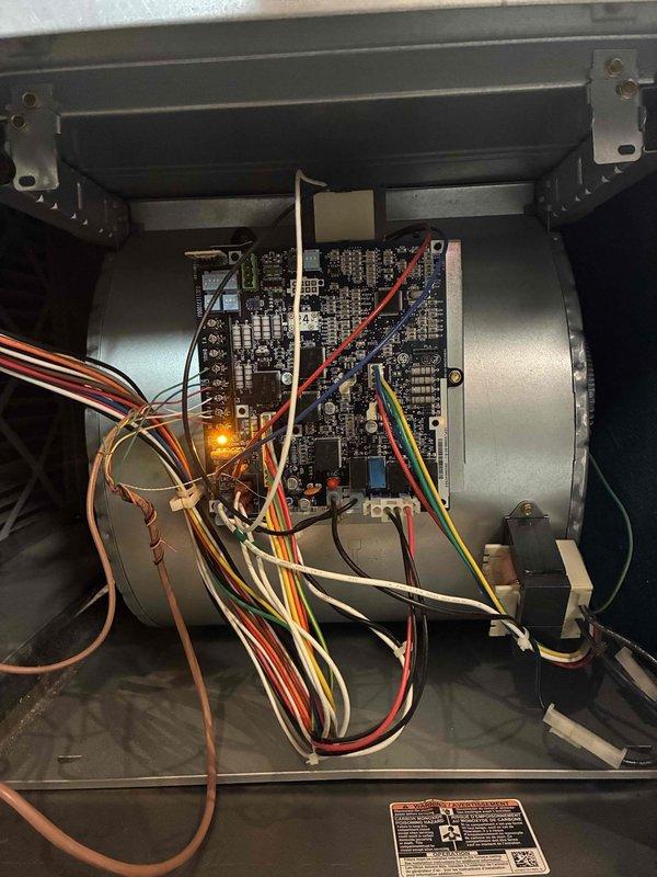 # HVAC Cooling Maintenance Completed

Performed comprehensive seasonal cooling maintenance on Carrier outdoor condensing unit and indoor air handler system. Inspected exterior condenser unit including compressor operation, refrigerant pressures, and electrical connections. Verified proper fan motor operation and examined heat exchanger coil fins for debris or damage. 

Accessed indoor air handler compartment and inspected blower motor assembly and control board. Verified all electrical connections, tested capacitor values, and confirmed proper LED diagnostic indicators on circuit board. Checked all wire harnesses and mounting brackets for secure installation. Conducted dehumidifier maintenance as part of the service visit. All system components operating within manufacturer specifications with no deficiencies noted.