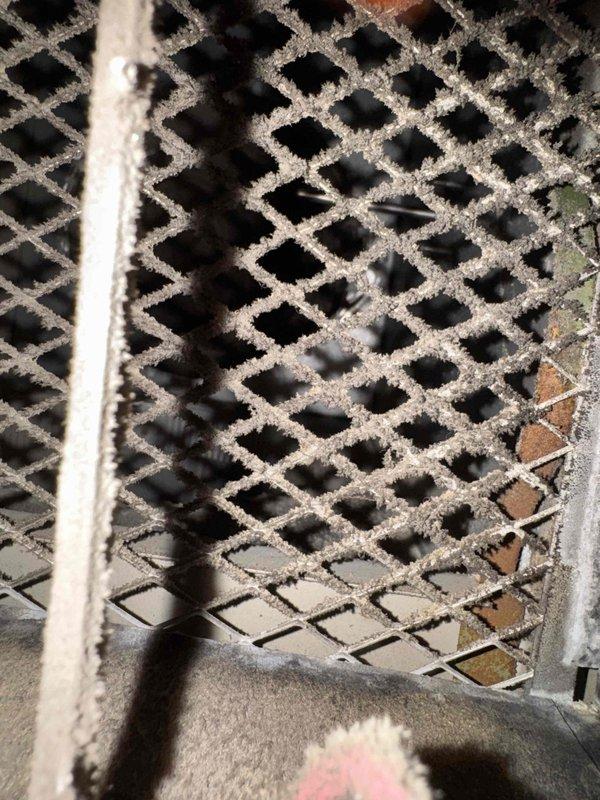 Responded to service call for air handler not cooling with burnt rubber smell. Upon inspection, accessed thermostat control panel and examined air handler unit. Found dirty, clogged return air filter restricting airflow, causing system to overheat and produce burning odor. Removed debris-laden filter and recommended replacement to restore proper system operation and prevent potential damage to blower motor components.
