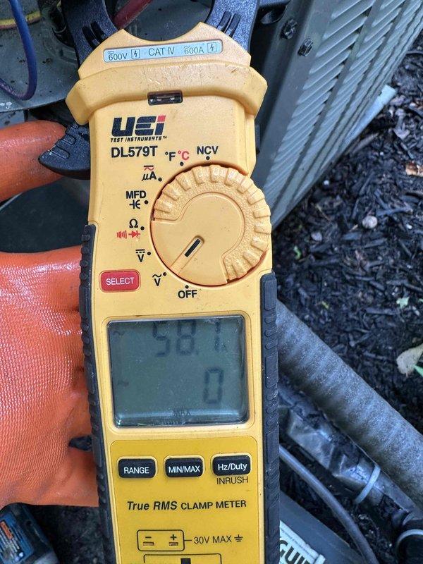 Completed cooling system tune-up on window HVAC unit during scheduled afternoon appointment. Performed electrical diagnostics using clamp meter to verify proper amperage draw and system operation, inspected and tested all electrical connections at terminal block for secure contact and proper voltage distribution across multiple circuits. All components found operating within normal parameters with connections cleaned and verified for safe, efficient cooling performance.