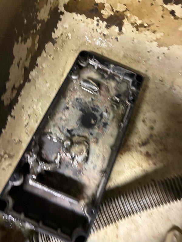 Responded to customer report of large amounts of water accumulating in basement when air conditioning system was running. Upon inspection, found condensate drainage system failure causing water to overflow onto basement floor, resulting in extensive water damage to flooring surfaces around floor register area. Identified failed condensate pump in utility sink area and addressed drainage issue to prevent further water accumulation.