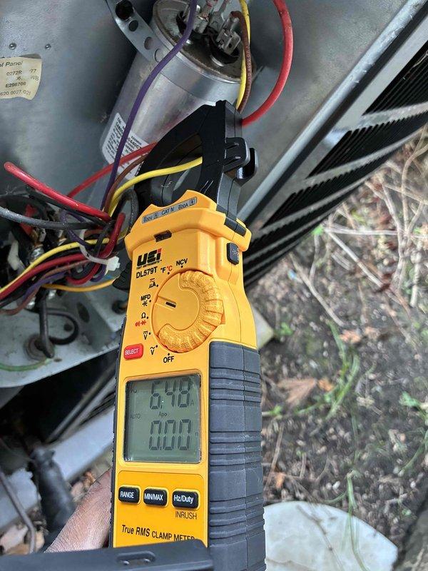 Performed routine cooling season maintenance on a 3-year-old Goodman HVAC system. Conducted comprehensive electrical diagnostics using clamp meter to verify proper amperage draw and system performance, measuring both low voltage control circuits (4.42A) and higher current components (193.3A). Replaced air filter and completed standard tune-up procedures to ensure optimal system operation for the cooling season.