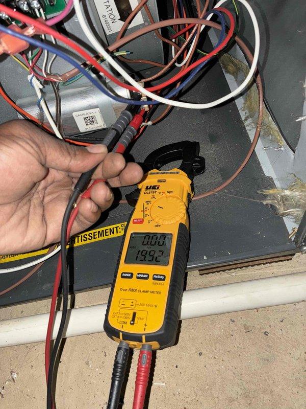 Performed routine cooling season maintenance on a 3-year-old Goodman HVAC system. Conducted comprehensive electrical diagnostics using clamp meter to verify proper amperage draw and system performance, measuring both low voltage control circuits (4.42A) and higher current components (193.3A). Replaced air filter and completed standard tune-up procedures to ensure optimal system operation for the cooling season.