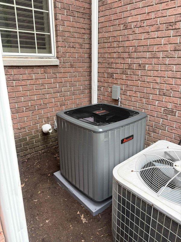 Completed full HVAC system installation including 96% high-efficiency gas furnace in basement mechanical room and outdoor air conditioning condenser unit. Installed new furnace with proper PVC venting configuration, connected flexible ductwork to existing system, and ran electrical conduit to code. Mounted AC condenser on concrete pad against exterior brick wall with proper clearances, established refrigerant line set connections, and verified all electrical connections at disconnect box. System tested and operational with proper airflow and temperature differentials confirmed.
