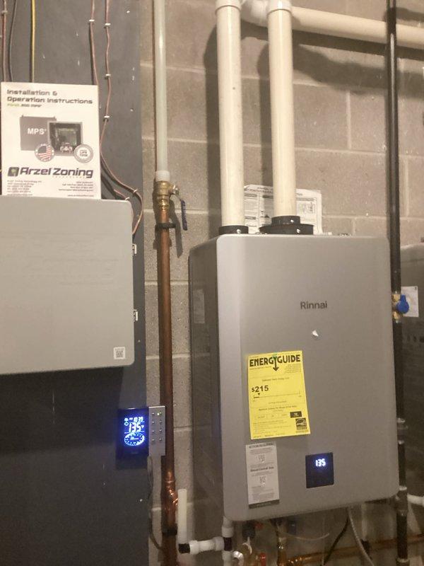 Provided comprehensive electrical estimate for backup generator installation at residential property. Evaluated existing 200-amp main service panel and HVAC zoning system to determine optimal integration point for automatic transfer switch and generator interconnection. Assessed electrical loads including tankless Rinnai water heater, Arzel zoning control system, and existing branch circuits to calculate required generator capacity and transfer switch specifications for seamless emergency power backup during utility outages.