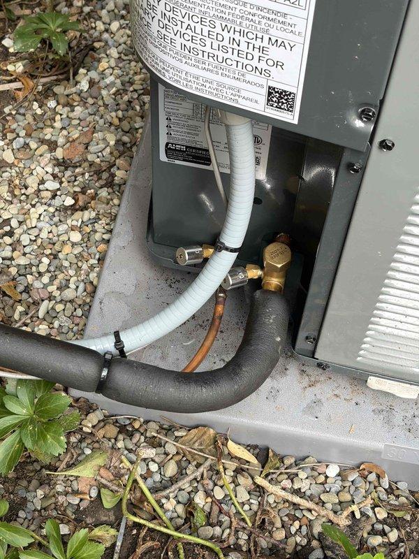 Responded to warranty concern regarding installation piping aesthetics. Inspected indoor and outdoor HVAC equipment, verified all refrigerant lines, condensate drainage, and electrical connections meet manufacturer specifications and code requirements. Documented system installation with photographs showing proper mounting, line set routing, and equipment placement for warranty records.