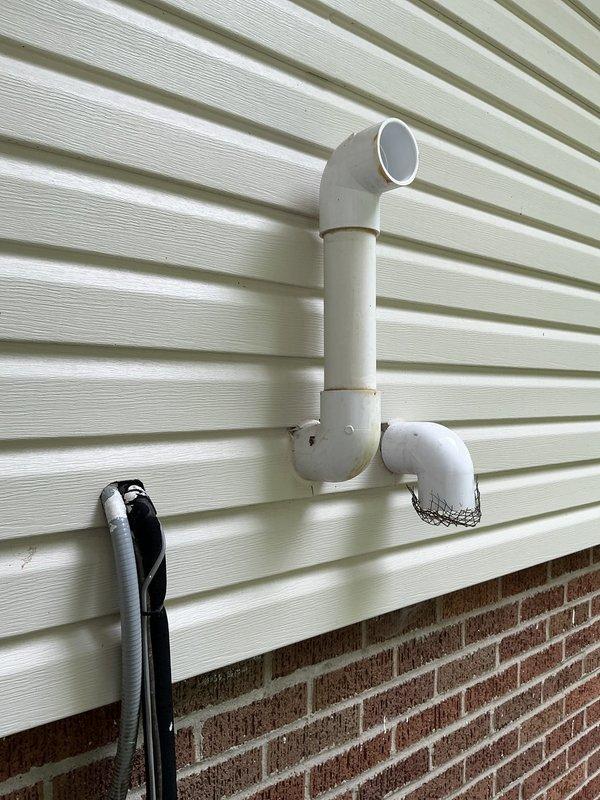 Conducted comprehensive site evaluation for full HVAC system replacement, presenting heat pump with backup heat options to customer. Documented existing equipment configuration including outdoor condensate drainage assembly and indoor control board wiring for replacement specifications.