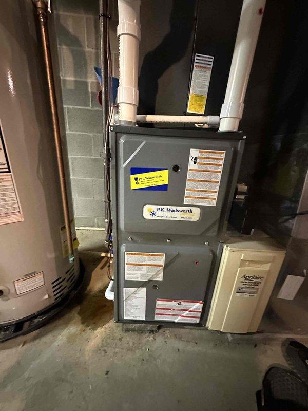 Completed cooling season tune-up on residential HVAC system. Performed comprehensive inspection of indoor furnace unit and outdoor condensing unit, verified electrical disconnect and fuse assembly operation, checked refrigerant levels, cleaned components as needed, and tested system performance. All equipment found to be operating within normal parameters with no deficiencies noted.