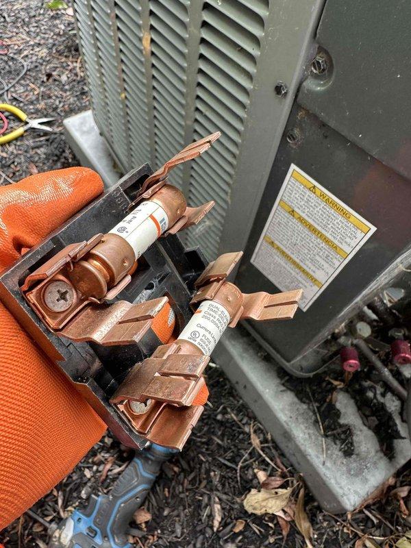 Completed cooling season tune-up on residential HVAC system. Performed comprehensive inspection of indoor furnace unit and outdoor condensing unit, verified electrical disconnect and fuse assembly operation, checked refrigerant levels, cleaned components as needed, and tested system performance. All equipment found to be operating within normal parameters with no deficiencies noted.