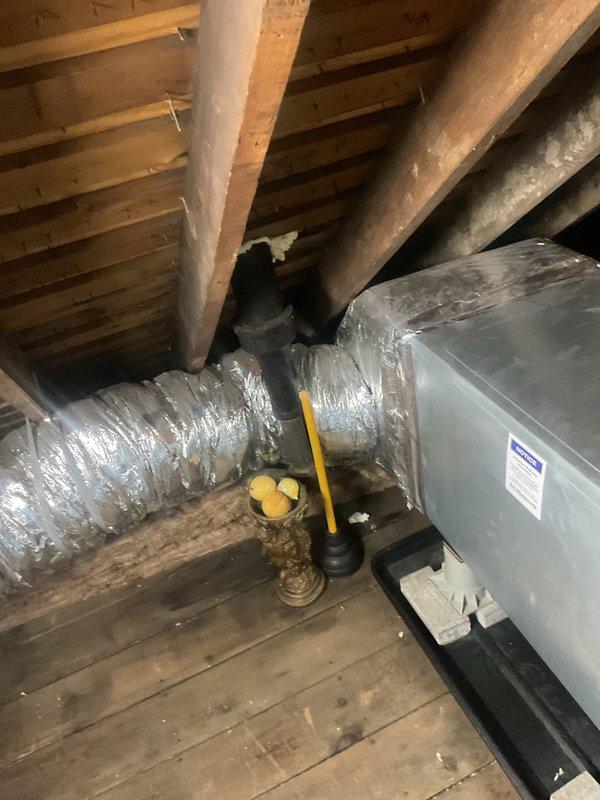 Completed routine HVAC cooling system maintenance in attic installation. Performed standard inspection of air handler unit, ductwork connections, and associated components including condensate management system. All equipment found in proper working condition with no issues identified during service visit.
