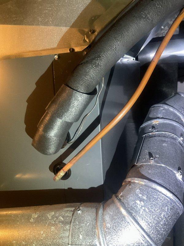 Completed cooling system tune-up during scheduled maintenance window. Performed standard inspection of furnace unit and ductwork system, noting significant condensation present on insulated supply duct in attic space, indicating possible insulation degradation or excessive humidity levels. Documented equipment condition with photos for customer records and verified all accessible system components and connections.