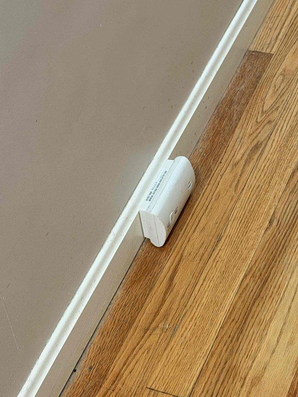 Completed installation of Ecobee3 smart thermostat with remote temperature sensor. Mounted main thermostat unit on wall and positioned wireless room sensor on baseboard for enhanced zone temperature monitoring. Verified system connectivity and configured mobile app integration for remote access and control.