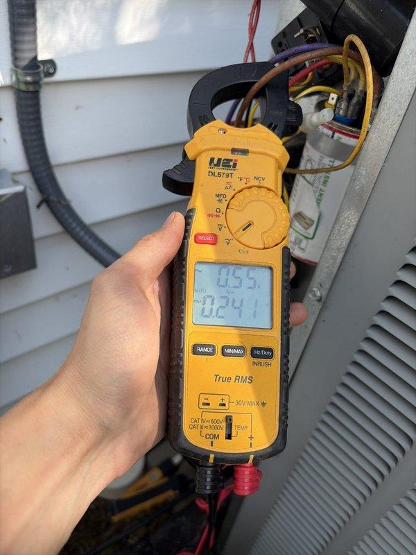 Completed comprehensive cooling maintenance on HVAC system, including electrical diagnostics using digital clamp meter to verify proper amperage draw and voltage readings at outdoor condensing unit. Performed temperature measurements confirming system operational parameters within manufacturer specifications at 71.6°F, with all electrical connections inspected and found secure at junction box.