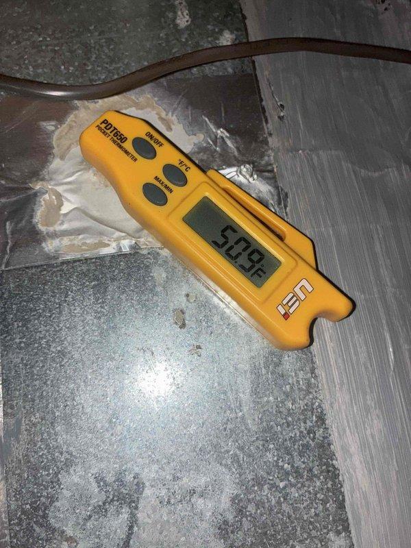Responded to no cooling complaint on residential air conditioning system. Upon arrival, performed diagnostic evaluation of unit and components. Measured supply air temperature at 54.2°F using calibrated digital thermometer, confirming adequate cooling output from evaporator coil. Inspected air filter and found it in satisfactory condition with proper airflow. System operational and cooling effectively at time of inspection.