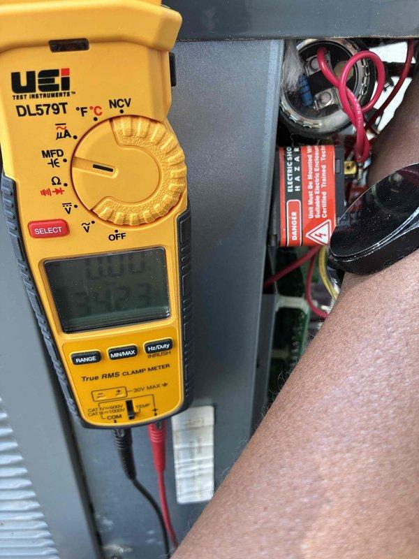 Completed cooling tune-up on two-system residential HVAC installation for non-member customer. Performed comprehensive electrical diagnostics using digital clamp meter to verify proper amperage draw and system performance. Measured and documented electrical parameters on both units, including voltage readings and current flow to ensure equipment was operating within manufacturer specifications. Inspected capacitors, wiring connections, and electrical components in both systems, confirming all measurements were within acceptable ranges for safe and efficient operation.