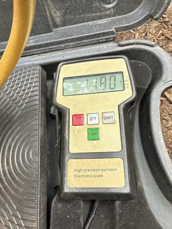 Returned to site to complete replacement of refrigerant lineset and outdoor condensing unit. Removed existing lineset and installed new copper refrigerant lines from indoor air handler to exterior condenser location. Mounted replacement condenser unit on outdoor pad, connected electrical service, and brazed refrigerant lines to both indoor and outdoor coils. Evacuated system to proper vacuum levels, charged unit with refrigerant to manufacturer specifications per equipment nameplate, and verified proper weight using precision electronic scale. Tested system operation, confirmed proper amperage draw, and verified all connections for leaks. Unit operating within normal parameters upon completion.