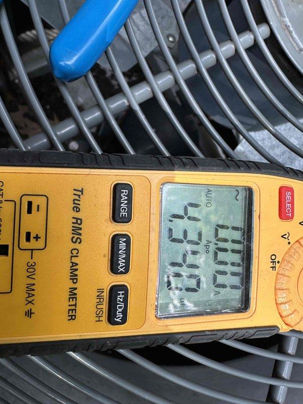Completed comprehensive cooling system tune-up and performance evaluation. Measured and recorded operating amperage at 70.52A using calibrated clamp meter, verified electrical parameters within manufacturer specifications, and inspected condenser unit components. Noted potential corrosion concerns on exterior cabinet panels requiring future monitoring.