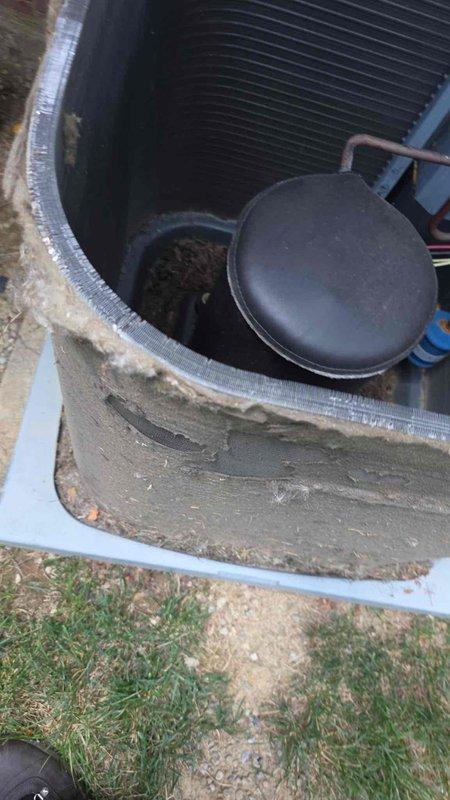 Replaced failed condenser fan motor on outdoor unit and performed thorough coil cleaning to restore proper airflow and heat transfer efficiency. Installed two compressor hard start capacitors and a surge protector to enhance system reliability and protect against electrical damage. Unit was found with significantly deteriorated exterior housing and accumulated debris, which was addressed during service to ensure optimal operation.