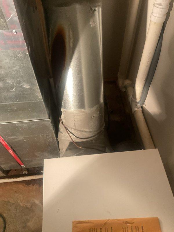 Completed estimate for replacement of non-functional whole-home dehumidifier system. Evaluated existing IAQ equipment and ductwork installation in mechanical room, noting moisture damage and staining on supply duct indicating previous humidity issues. Recommended Aprilaire E100 or equivalent dehumidifier system to address indoor air quality concerns, as current unit is beyond repair.