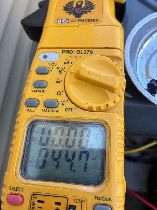 Performed non-member cooling system tune-up on residential air conditioning unit. Customer reported hearing a slight grinding noise from the outdoor unit during operation, though cooling performance remained unaffected. Conducted comprehensive system diagnostics using digital multimeter to measure electrical parameters and capacitance values. All measurements fell within normal operating ranges, and visual inspection of outdoor unit components revealed no obvious mechanical defects or loose parts. Air conditioning system continues to operate effectively with proper cooling output, though noise concern was noted for potential future monitoring.