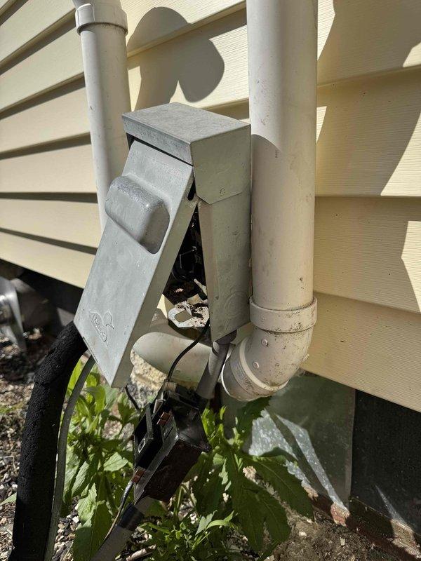 Responded to no-cooling call following exterior siding work at residence. Upon arrival, discovered outdoor disconnect switch had been compromised during construction activities. Inspection revealed bird nest material had infiltrated the electrical junction box, creating obstruction and potential safety hazard around electrical components and connections. Nest debris was packed around insulators and wiring, preventing proper operation of the disconnect switch and interrupting power supply to the condensing unit.

De-energized system and removed all nest material from junction box interior. Cleaned electrical contacts and verified integrity of all wire connections and terminals. Inspected conduit penetrations and sealed gaps where pest intrusion occurred. Restored power to unit and verified proper voltage at disconnect. Condensing unit returned to normal operation with appropriate amperage draw. Tested system through complete cooling cycle to confirm restoration of functionality. Advised