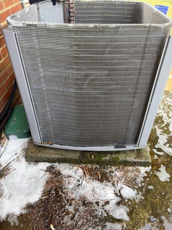 Performed deep cleaning of outdoor condenser coil to remove accumulated debris, dust, and organic matter that had built up between the aluminum fins, which was restricting airflow and reducing system efficiency. Replaced failed dual-run capacitor with new 45/10 MFD unit to restore proper compressor and condenser fan motor operation.