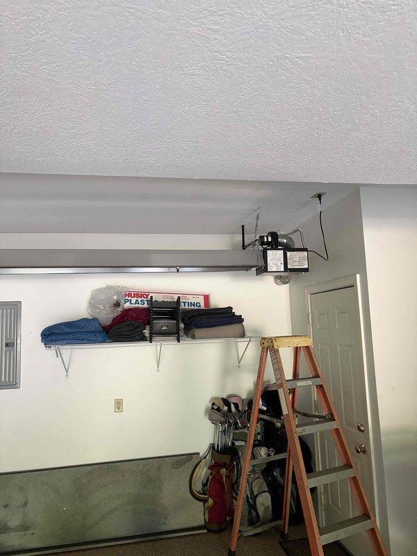 Completed garage heater replacement with new unit properly mounted to ceiling structure. Removed existing heater and returned old unit same day for credit as requested. New heater installed with appropriate venting, electrical connections secured, and all safety labels verified in place for code compliance.
