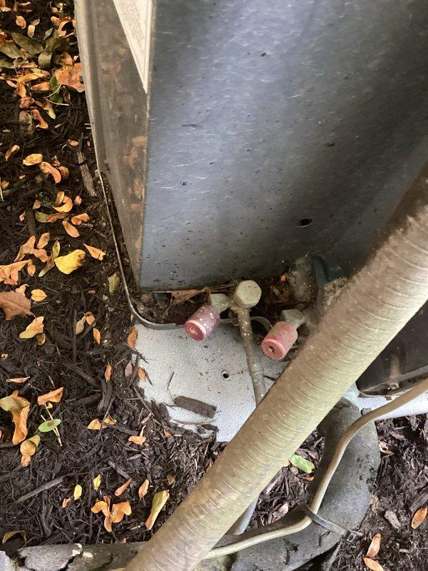 Performed comprehensive cooling system tune-up on outdoor HVAC unit. Inspected refrigerant lines, verified proper insulation on suction line, checked all pipe connections and fittings for integrity, and measured system temperatures using digital gauges. All components found to be operating within normal parameters with no leaks detected.