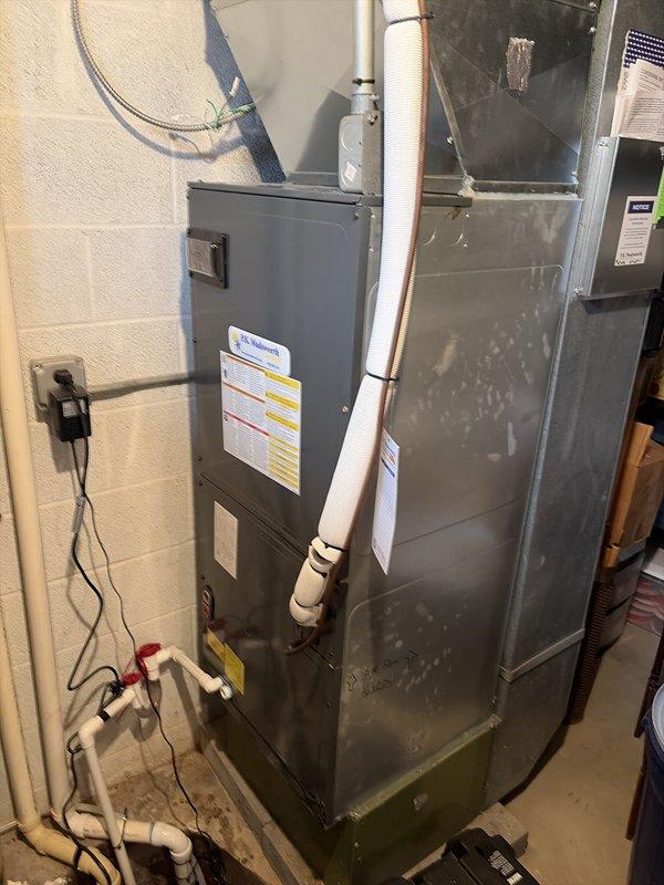 # HVAC Cooling Maintenance Completed

Performed comprehensive cooling system maintenance on residential air handler unit as part of recurring preventive maintenance program. Conducted electrical diagnostics using digital clamp meter, recording amperage readings of 342A and 70.030A to verify proper system operation and component performance. Inspected air handler unit, associated refrigerant lines with service valves, condensate drainage system, and electrical connections within junction box. All system components found operating within normal parameters with no issues identified requiring immediate attention.