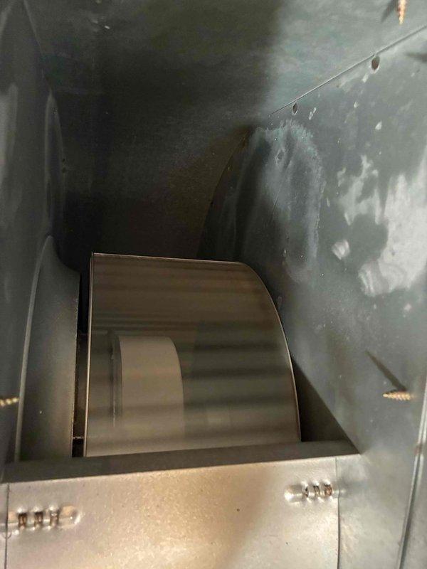 Completed cooling system tune-up for non-member residential HVAC unit. Performed standard maintenance inspection including blower assembly examination and temperature differential testing, with supply air temperature measuring 50°F. All components found operating within normal parameters with typical dust accumulation noted in air handling unit.