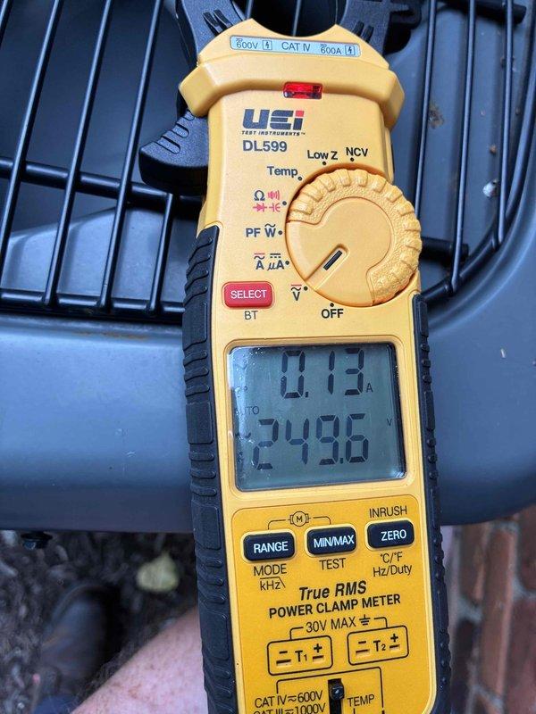 Performed comprehensive HVAC cooling system maintenance under MVP program. Conducted electrical diagnostics using True RMS power clamp meter, measuring amperage draw on compressor/condenser fan motor at 0.13A and line voltage at 249.6V to verify proper system operation and load characteristics. All measurements within normal operating parameters, confirming system functionality and electrical efficiency.
