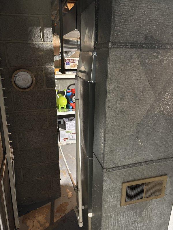 Completed installation of Goodman air conditioning system with new furnace unit in basement utility area. Installed and connected refrigerant lines, ductwork with insulated plenum, and integrated thermostat control. System tested and operational, with all components properly secured and code-compliant installation verified.